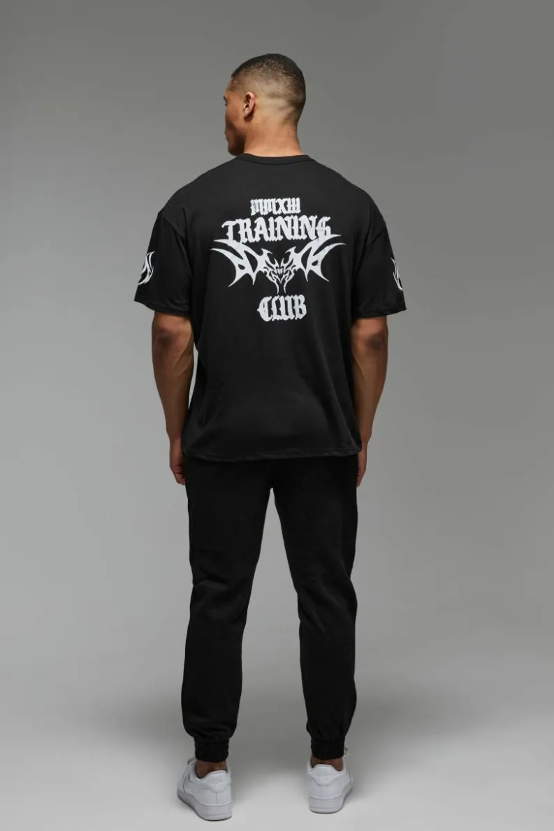 Shop boohooMAN Man Active Training Club Oversized T-shirt black