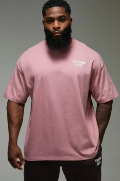 Shop boohooMAN Man Active Training Dept. Oversized T-shirt pink