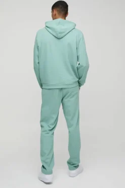 Shop boohooMAN Man Embroidered Waffle Hooded Tracksuit dusty green