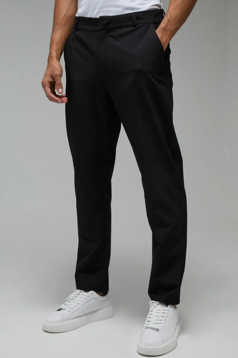 Store boohooMAN Man Sport Golf Stretch Woven Tapered Joggers black