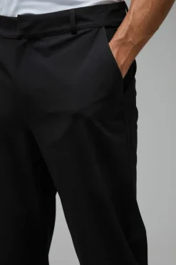 Store boohooMAN Man Sport Golf Stretch Woven Tapered Joggers black