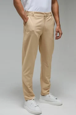 Fashion boohooMAN Man Sport Golf Stretch Woven Tapered Joggers sand