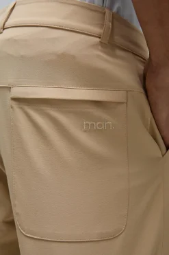 Fashion boohooMAN Man Sport Golf Stretch Woven Tapered Joggers sand