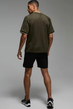 Shop boohooMAN Man Sport Oversized Performance T-shirt khaki