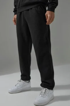 Shop boohooMAN Man Sport Waffle Regular Fit Jogger black