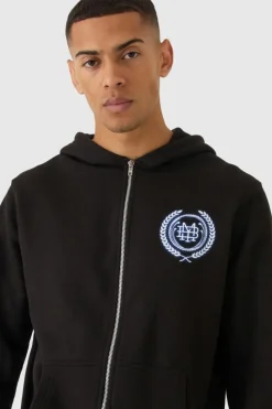 Shop boohooMAN MMXIII Crest Graphic Zip Through Hoodie black