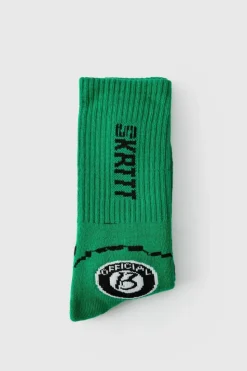 Shop boohooMAN Moto Racing Flag Socks green