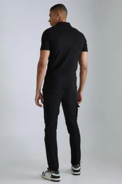 Best boohooMAN Muscle Zip Neck Polo black