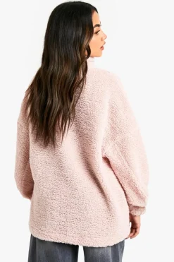 Store boohoo Nylon Pocket Detail Oversized Half Zip Borg Sweatshirt pink