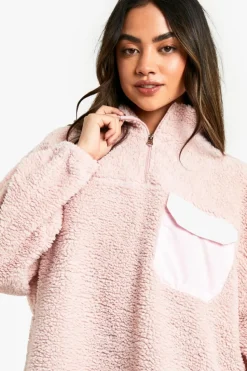 Store boohoo Nylon Pocket Detail Oversized Half Zip Borg Sweatshirt pink
