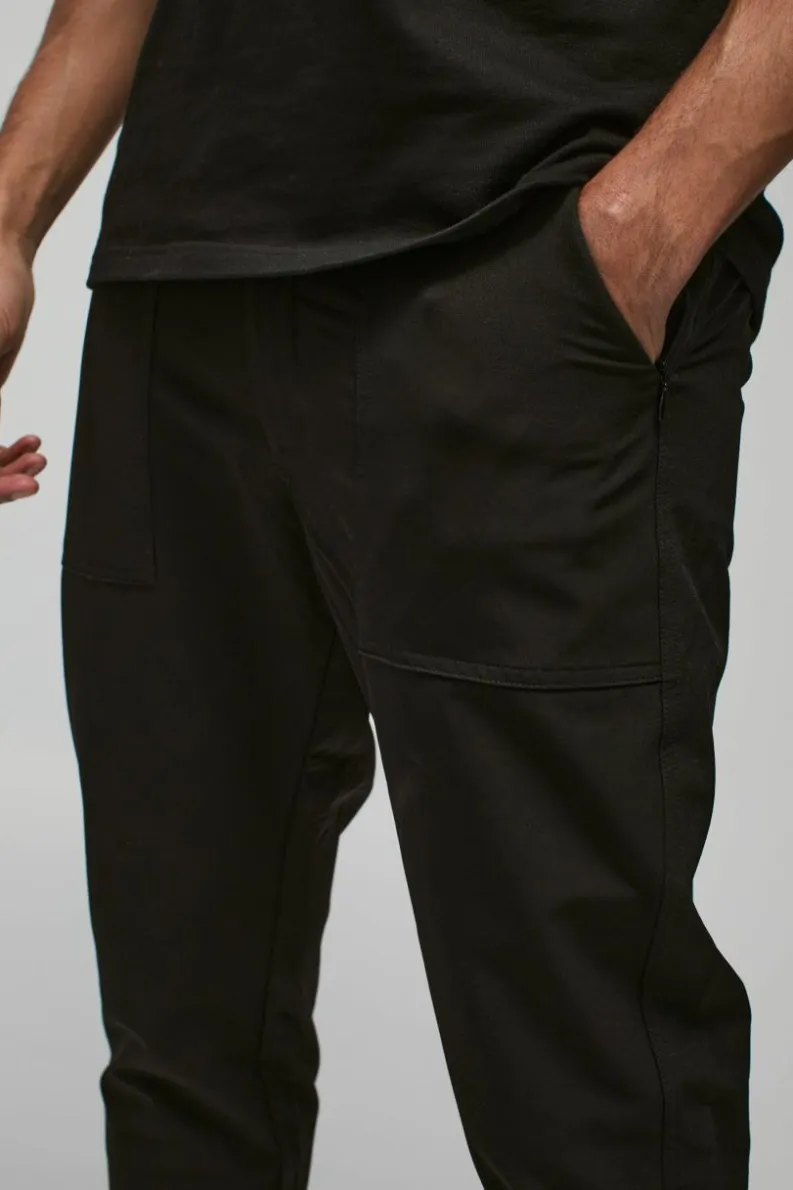 Shop boohooMAN Nylon Technical Stretch Slim Trouser black