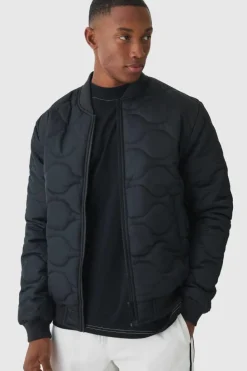 Hot boohooMAN Official Quilted Bomber Jacket In black