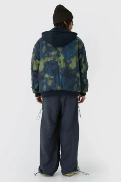 Online boohooMAN Oversized Abstract Print Hooded Bomber Jacket In navy