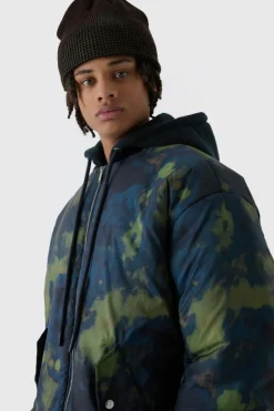 Online boohooMAN Oversized Abstract Print Hooded Bomber Jacket In navy