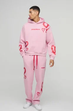 Clearance boohooMAN Oversized Boxy All Over Heart Printed Hooded Tracksuit pink