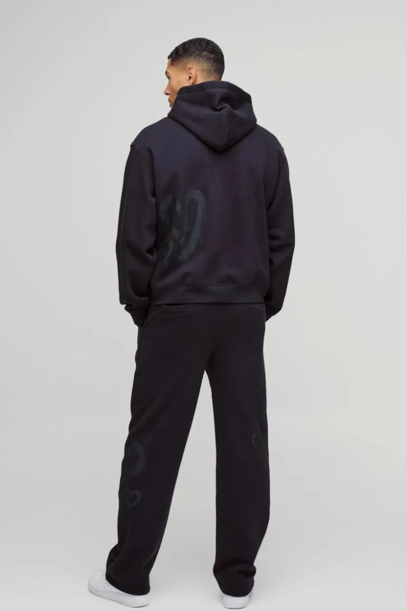 Shop boohooMAN Oversized Boxy All Over Heart Printed Hoodie black
