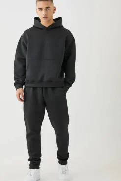 Shop boohooMAN Oversized Boxy Bonded Scuba Hooded Tracksuit black