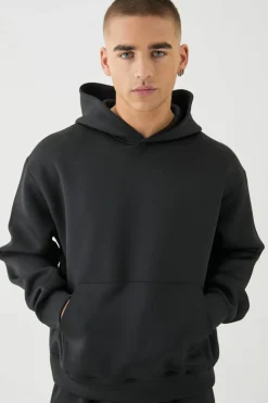 Shop boohooMAN Oversized Boxy Bonded Scuba Hooded Tracksuit black