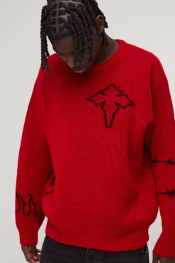 Shop boohooMAN Oversized Boxy Brushed Multi Doodle Graphic Knitted Jumper red