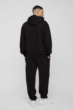 Online boohooMAN Oversized Boxy Cross Printed Hooded Tracksuit black