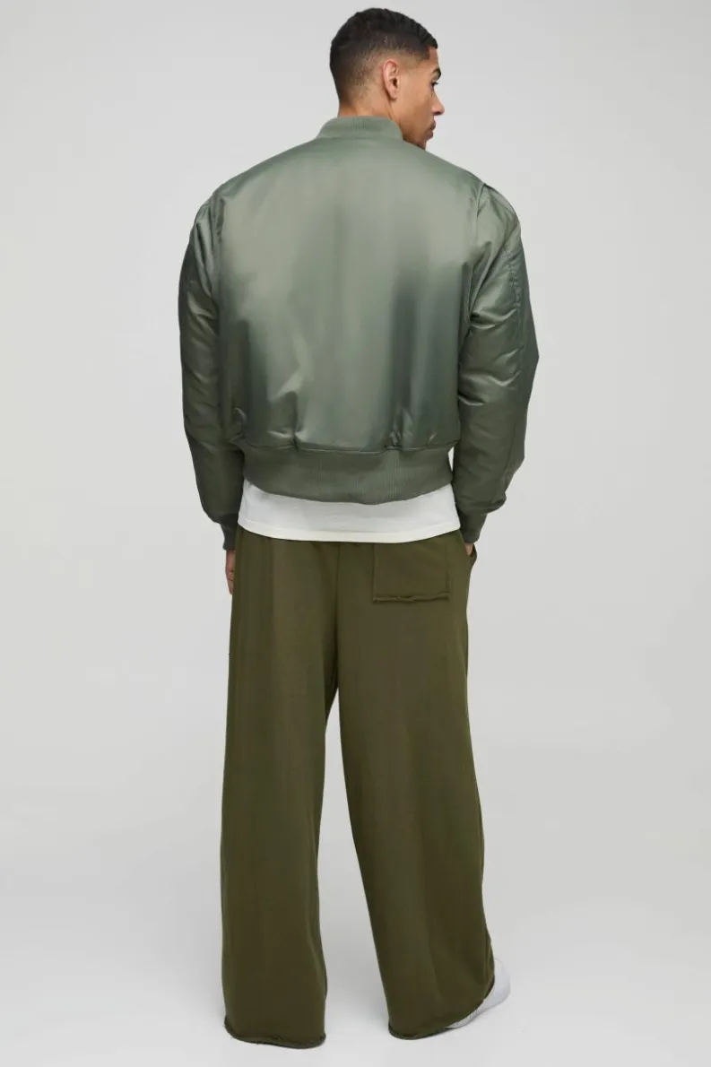 Online boohooMAN Oversized Boxy Curved Hem Nylon Bomber Jacket olive