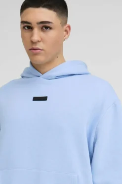Fashion boohooMAN Oversized Boxy Drop Crotch Hooded Tracksuit With Rubber Badge light blue