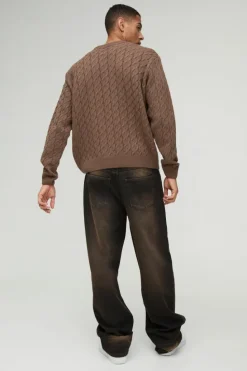 Shop boohooMAN Oversized Boxy Fit Cable Knit Jumper taupe