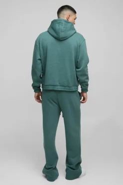 Store boohooMAN Oversized Boxy Flare Stacked Hooded Tracksuit With Rubber Badge forest