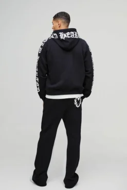 Shop boohooMAN Oversized Boxy Gothic Heart Print Zip Through Raglan Hoodie black