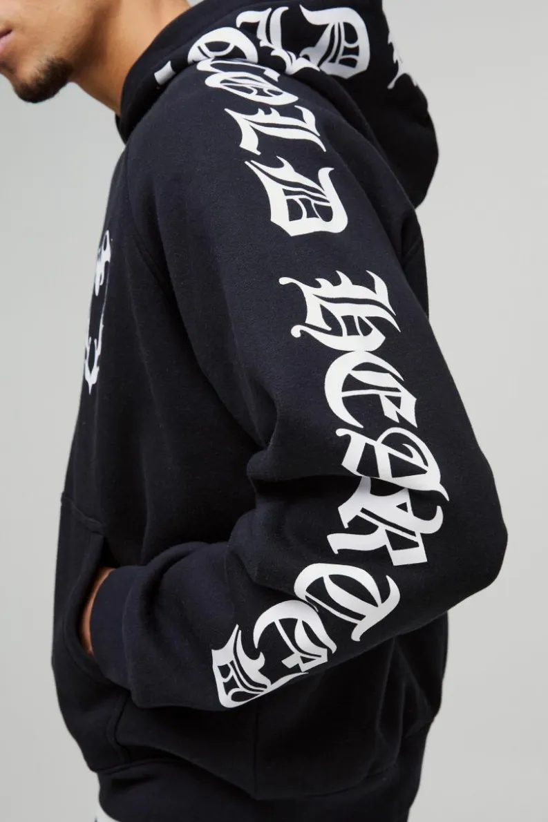 Shop boohooMAN Oversized Boxy Gothic Heart Print Zip Through Raglan Hoodie black