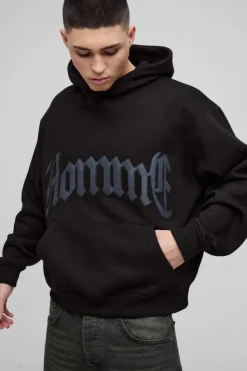 Shop boohooMAN Oversized Boxy Homme PU Applique Hoodie black