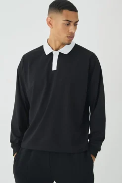 Shop boohooMAN Oversized Boxy Long Sleeve Contrast Polo black