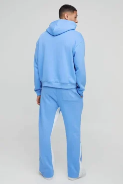 Online boohooMAN Oversized Boxy Paint Splatter Homme Gusset Tracksuit light blue