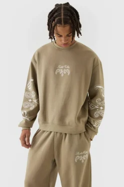 Shop boohooMAN Oversized Boxy Paisley Print Sweatshirt Tracksuit taupe