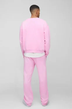 Discount boohooMAN Oversized Boxy Spray Wash Ofcl Printed Sweat Tracksuit pink