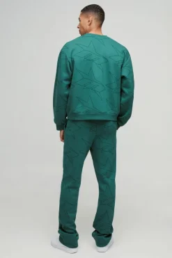 Shop boohooMAN Oversized Boxy Star All Over Printed Sweat Tracksuit forest