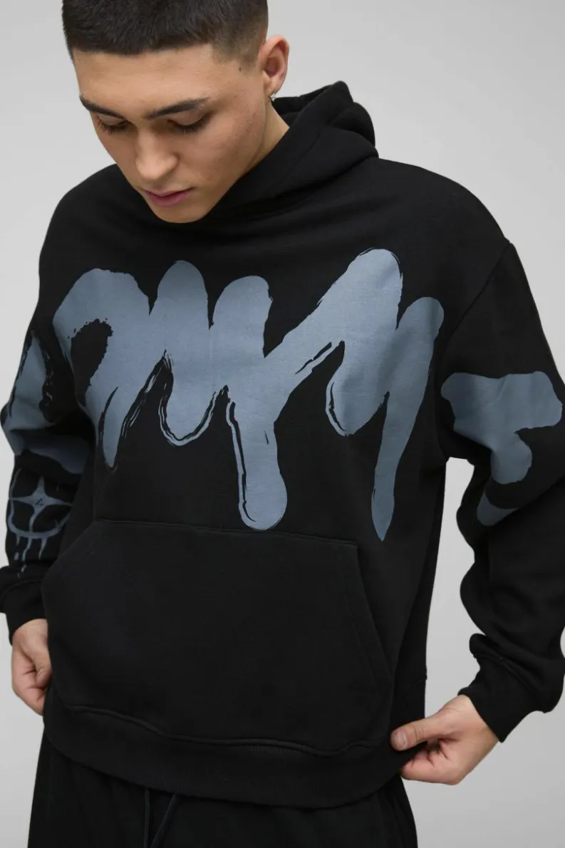 Shop boohooMAN Oversized Boxy Star Homme Hoodie black