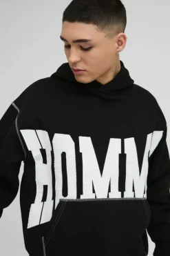 Shop boohooMAN Oversized Boxy Twill Applique Contrast Stitch Hoodie black
