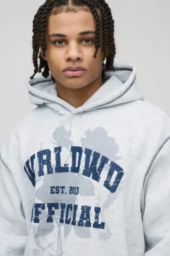 Store boohooMAN Oversized Boxy Varsity Worldwide Printed Raw Hem Flare Hooded Tracksuit grey
