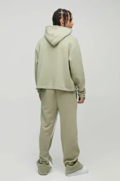 Hot boohooMAN Oversized Boxy Varsity Worldwide Printed Raw Hem Flare Hooded Tracksuit khaki