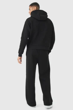 Store boohooMAN Oversized Boxy Worldwide Emboss Wide Leg Tracksuit black