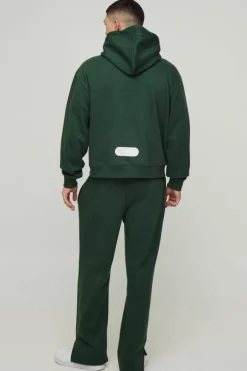 Store boohooMAN Oversized Boxy Worldwide Hooded Tracksuit forest
