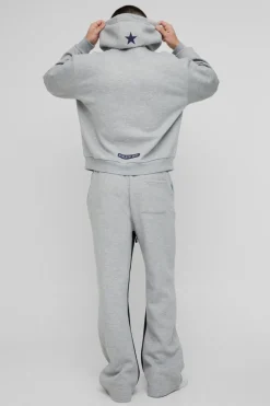 Hot boohooMAN Oversized Boxy Worldwide Star Varsity Hooded Gusset Tracksuit grey marl