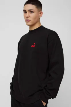 Shop boohooMAN Oversized Cherry Embroidered Sweatshirt black