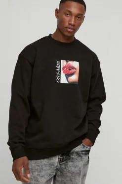 Shop boohooMAN Oversized Cherry Lips Box Graphic Sweatshirt black