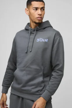 Shop boohooMAN Oversized Disney Lilo and Stitch License Print Hoodie charcoal