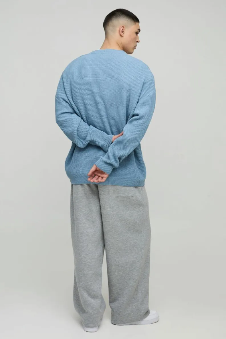 Store boohooMAN Oversized Dropped Shoulder Ribbed Knitted Cardigan light blue
