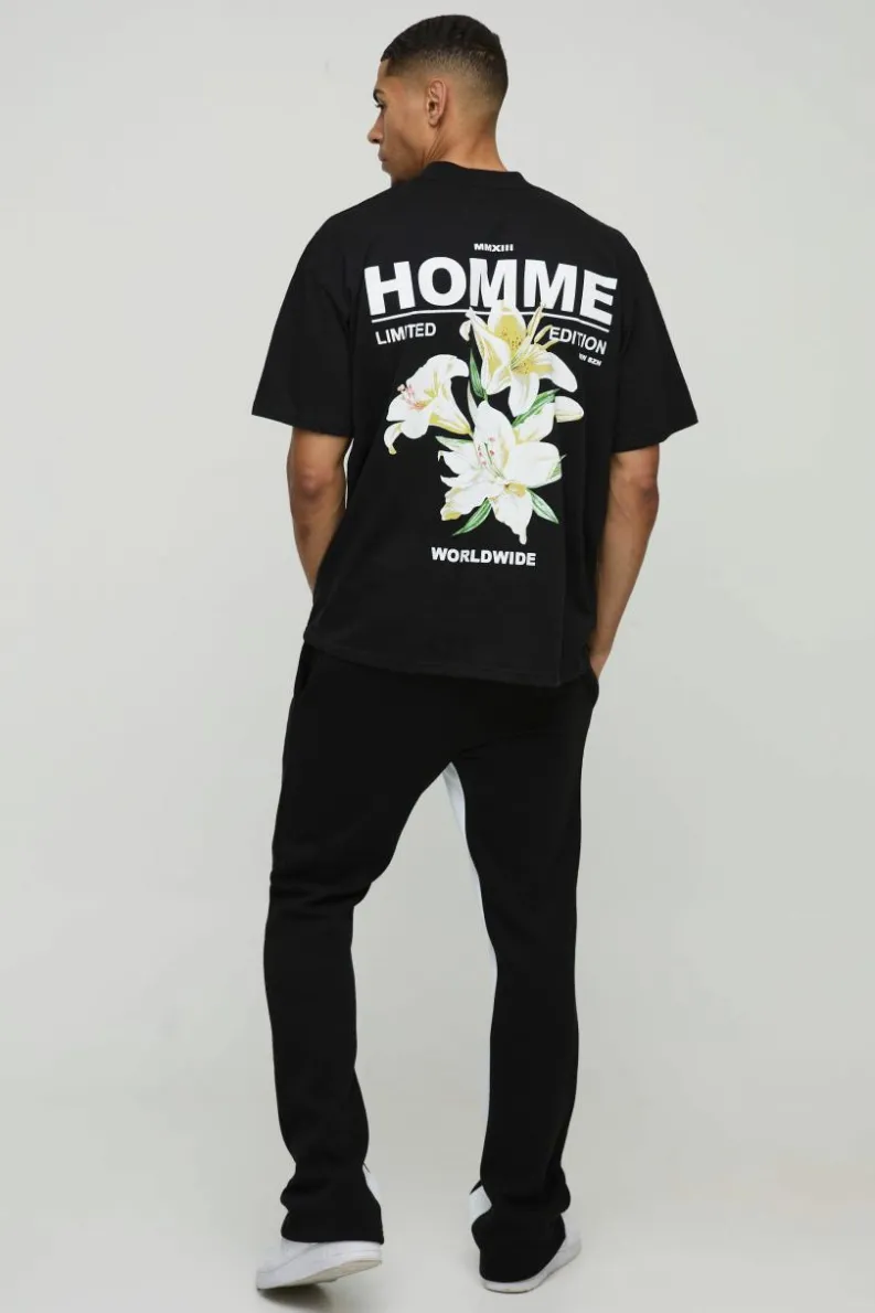 Shop boohooMAN Oversized Extended Neck Homme Lily Graphic T-Shirt black
