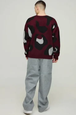 Shop boohooMAN Oversized Eyelash Knit Leopard Print Knitted Jumper burgundy