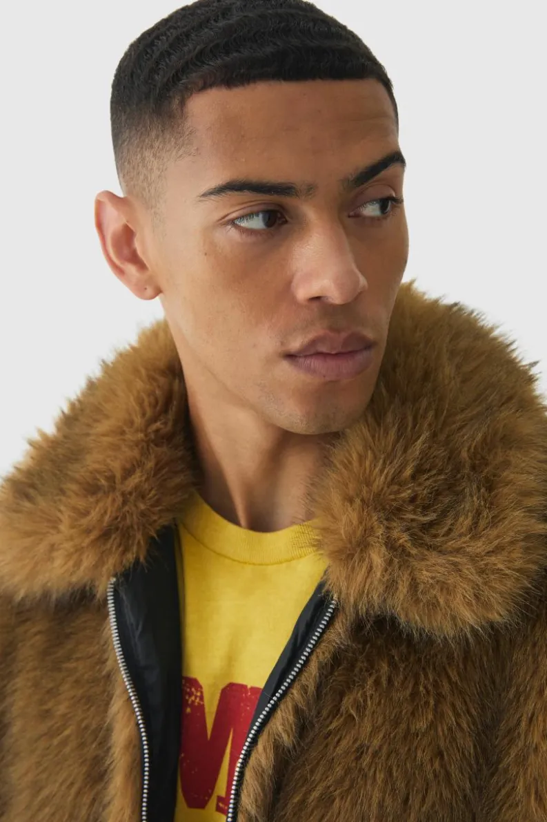 Online boohooMAN Oversized Faux Fur Harrington Jacket In brown